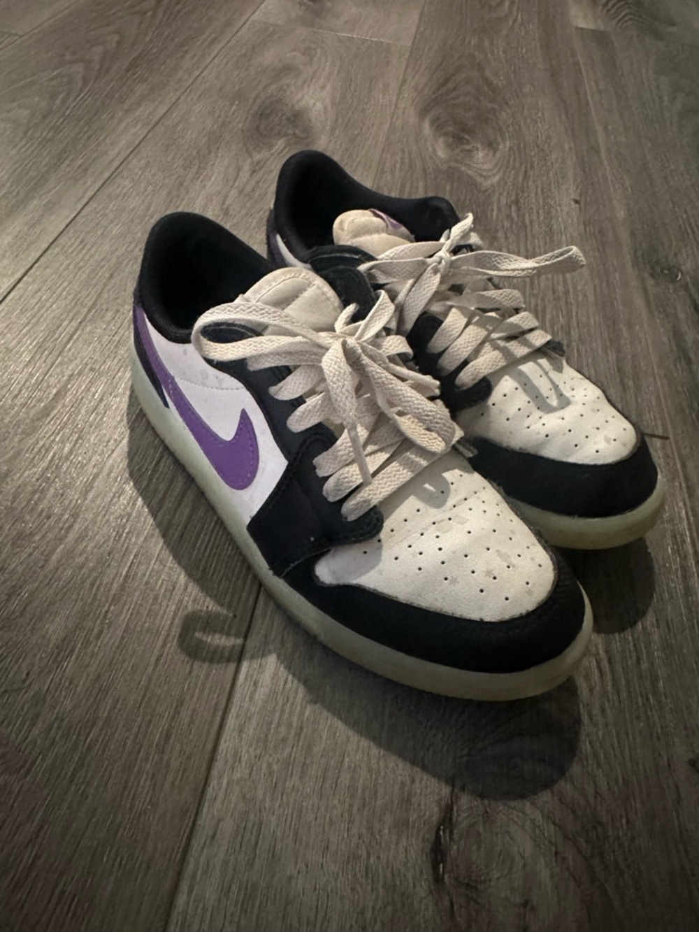 Jordan Kids Black and White Low Top Sneaker glow in the dark sole and toe
